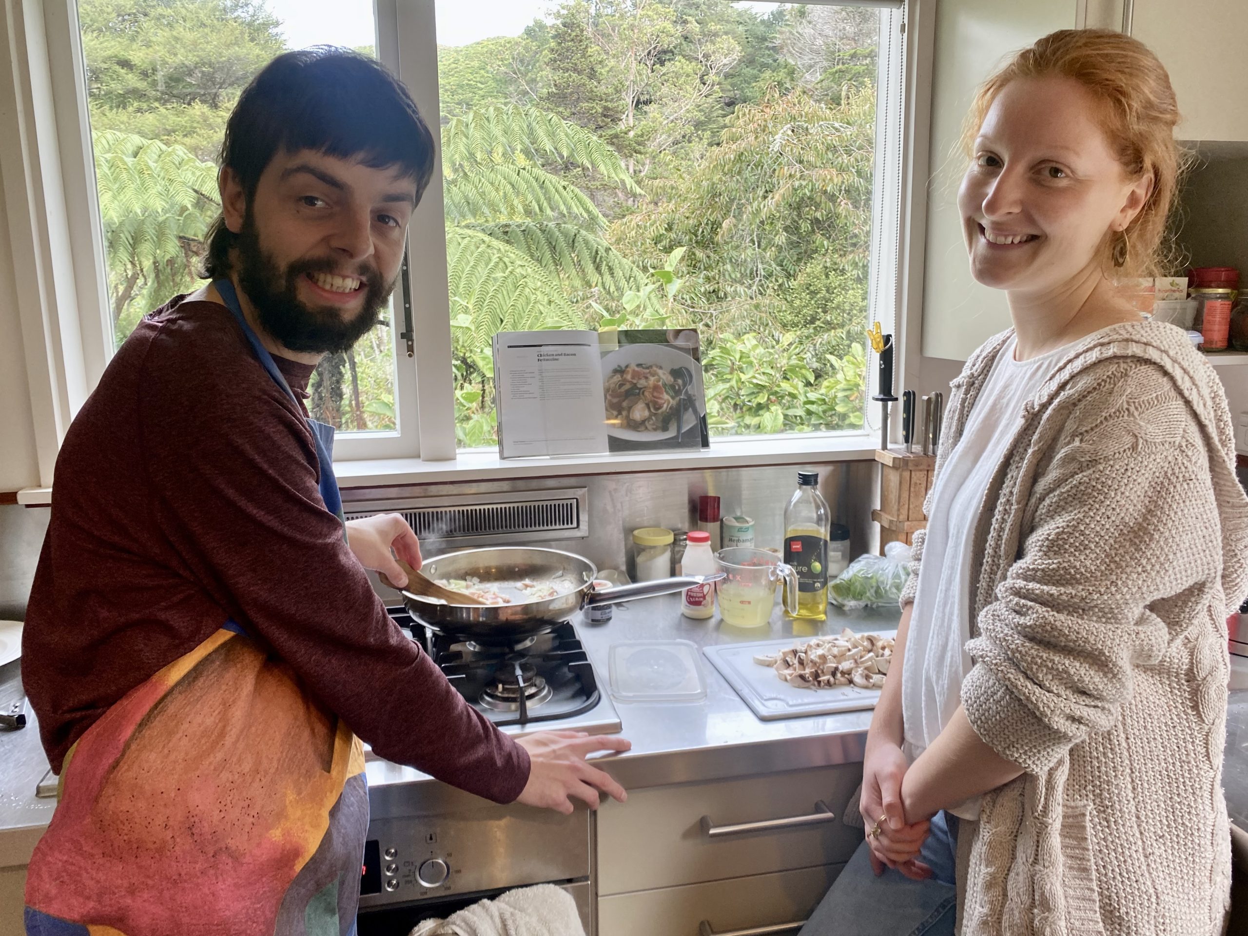 Oliver Gordon Oliver (left) cooking a meal with support
