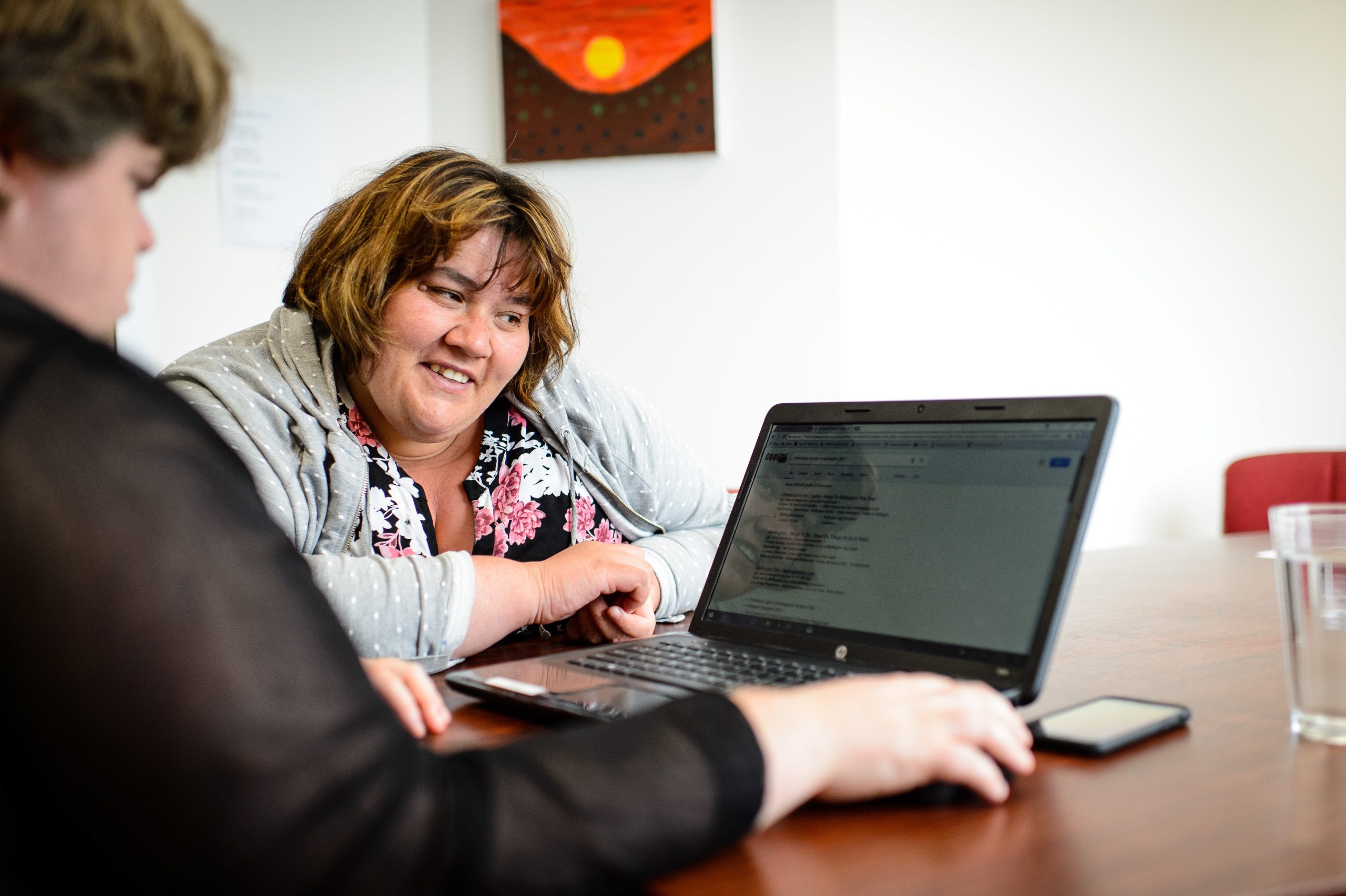 Jenna (right) supported Alison (left) on the computer