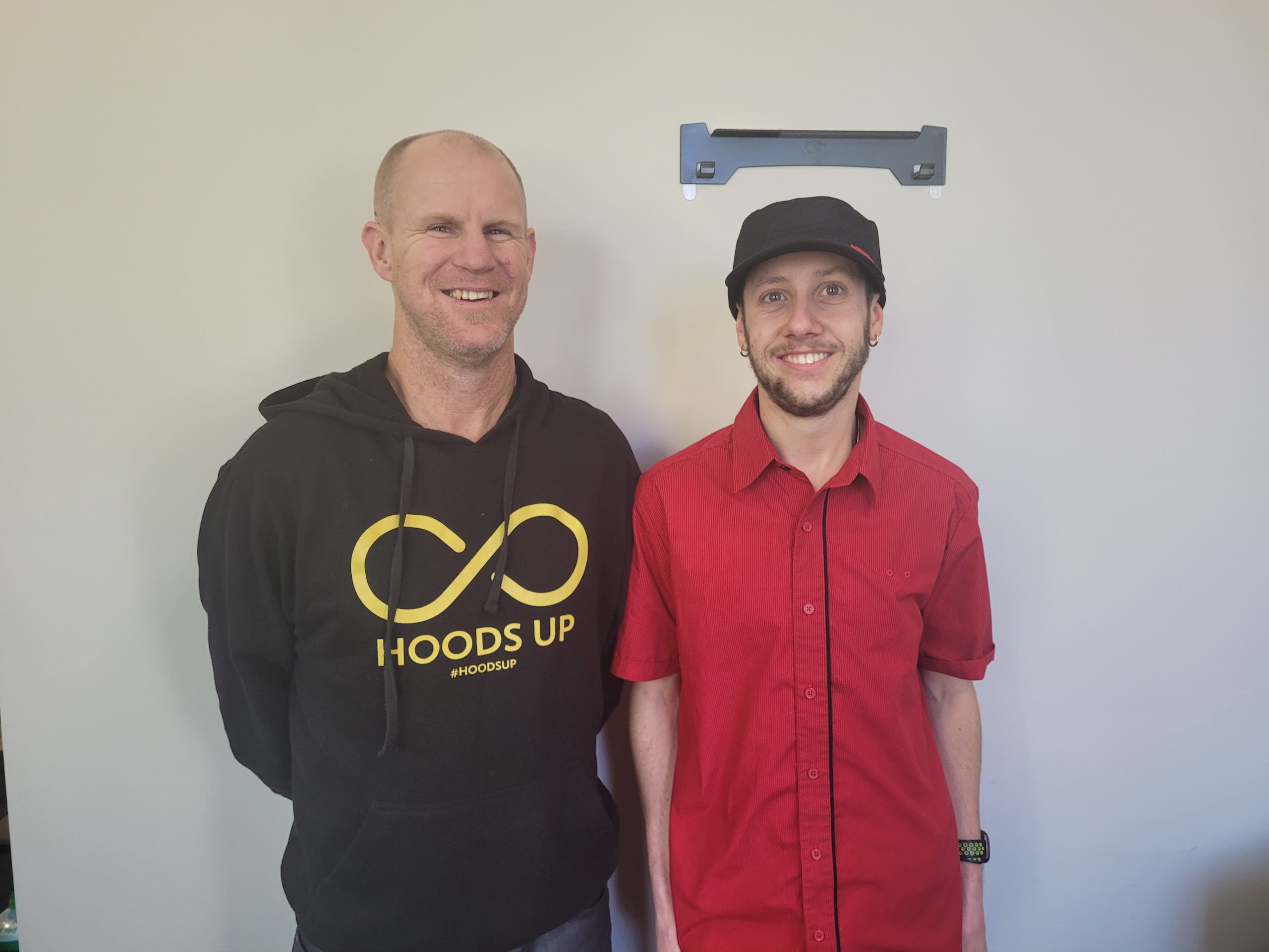 Nick (right) in his McDonalds uniform with his support worker Tim (left)