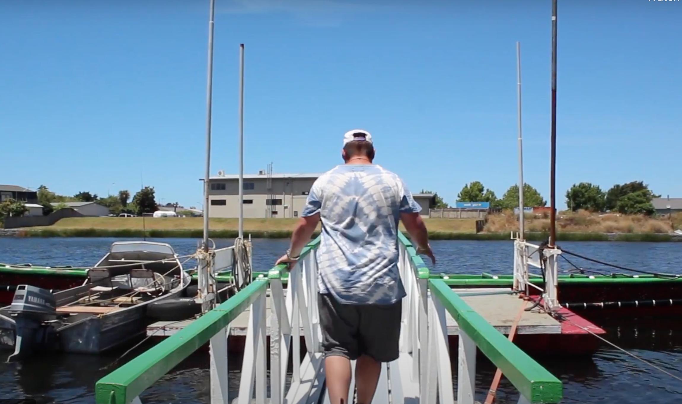 John walking down to the boat dock