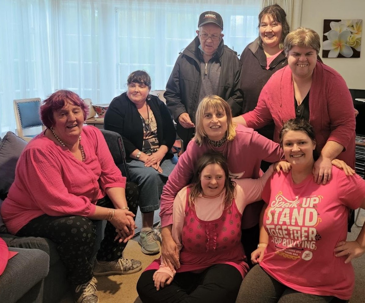 Network group wearing pink shirts for fundraising